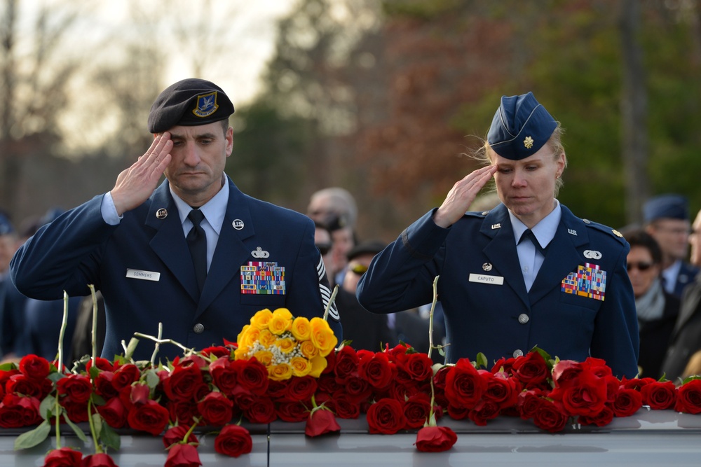 Airmen from the 105th Airlift Wing bid farewell to one of their own