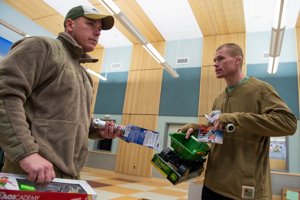 Toys for Tots Marines travel across the Northwest Arctic Borough to deliver holdiay gifts