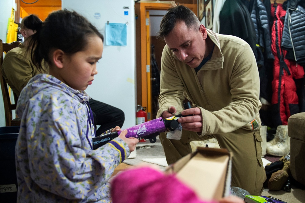 Toys for Tots Marines travel across the Northwest Arctic Borough to deliver holdiay gifts