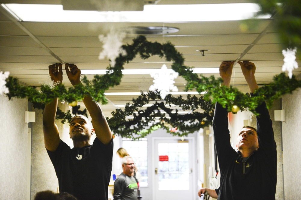 92nd LRS Airmen bring holiday cheer to veterans