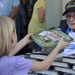 USS Arizona Survivors Meet with Youth, Families during Book Signing
