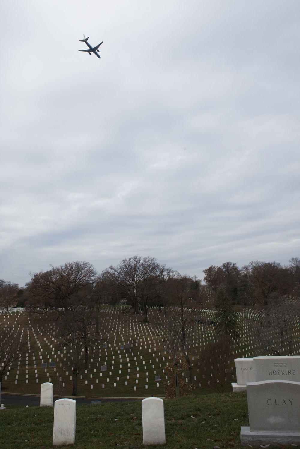 Air Force Two conducts a fly-over above Arlington National Cemetery