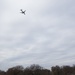 Air Force Two conducts a fly-over above Arlington National Cemetery