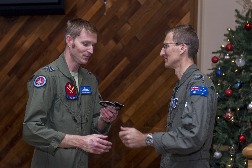 Members of the Royal Australian Air Force graduate from the EA-18G Growler pilot and electronic warfare officer pilot exchange program.