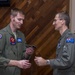 Members of the Royal Australian Air Force graduate from the EA-18G Growler pilot and electronic warfare officer pilot exchange program.