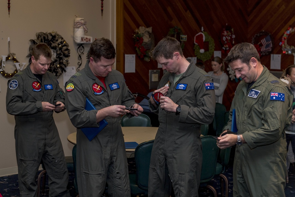 Members of the Royal Australian Air Force graduate from the EA-18G Growler pilot and electronic warfare officer pilot exchange program.