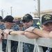 COMSUBRON 15 Sailors wait to welcome USS Oklahoma City (SSN 723) back to Guam Dec. 8, 2016