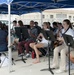 Guam High School Band plays music during the USS Oklahoma City (SSN 723) Homecoming Dec. 8,2016