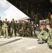 Operation Christmas Drop participants honor fallen Airman