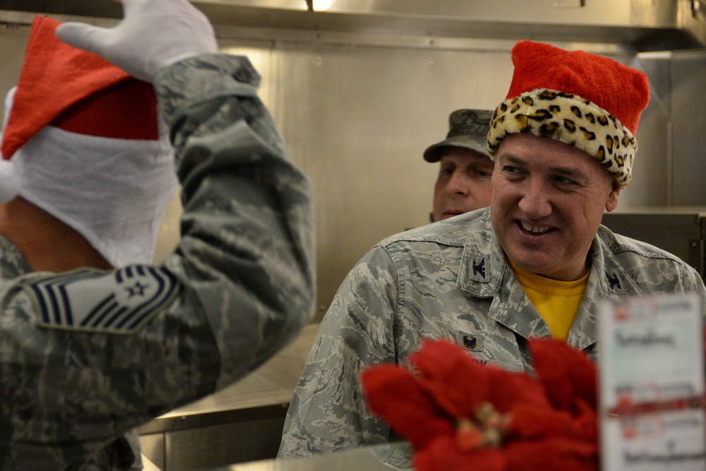 Commander help serves the holiday meal