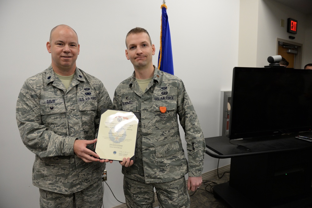 Maj. Scott Treadwell receives Air Force Combat Action Medal