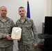 Maj. Scott Treadwell receives Air Force Combat Action Medal