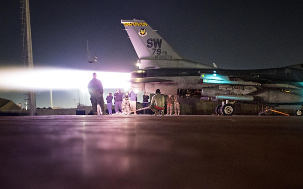 F-16 operations inspection lights up night