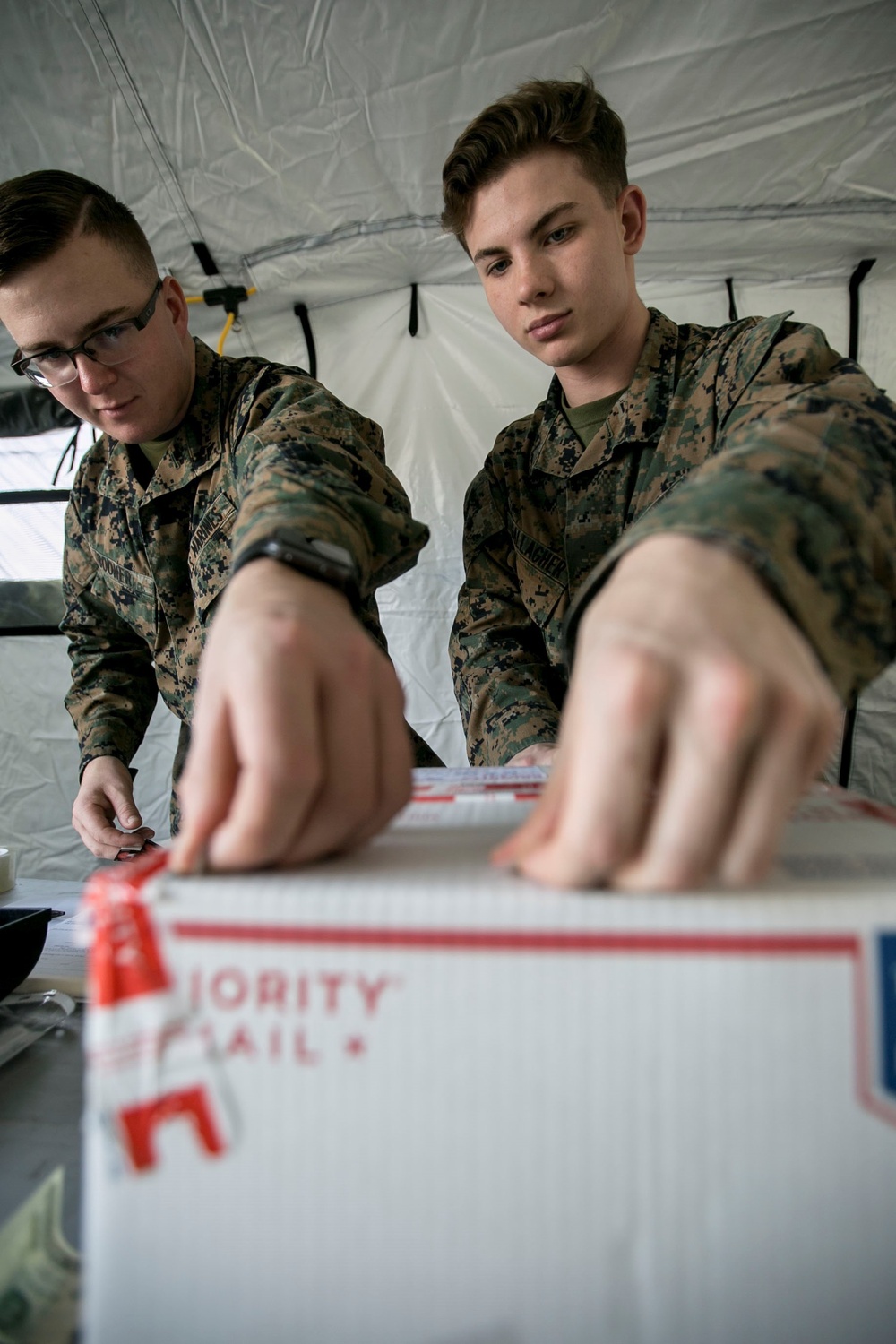 Postal Marines perform field training exercise on Camp Hansen