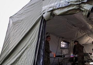 Postal Marines perform field training exercise on Camp Hansen