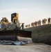 Armored bulldozer removes roadblocks