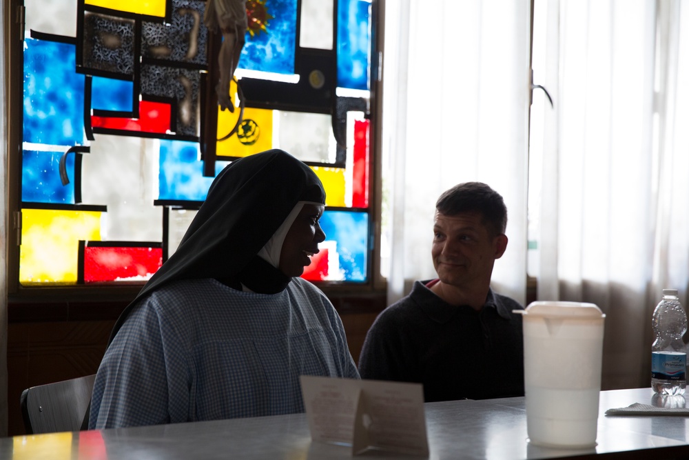Lending a helping hand: Marines and Sailors volunteer at local monastery