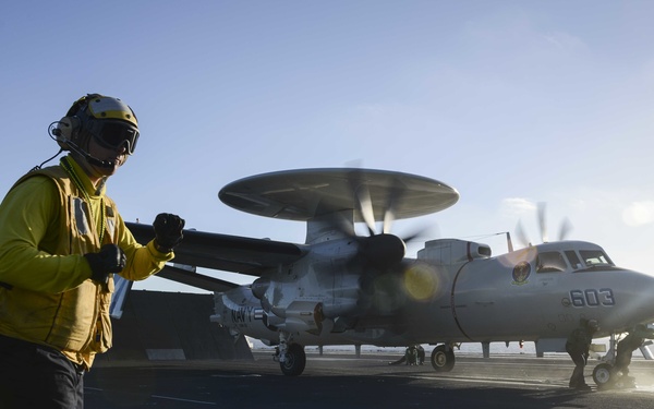 Sailor prepares to launch an E-2D