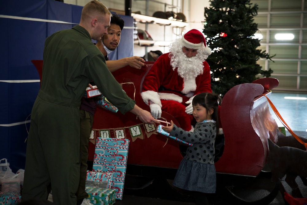 Aircraft Rescue and Firefighting Marines bring Christmas to orphans