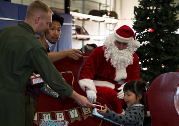 Aircraft Rescue and Firefighting Marines bring Christmas to orphans