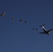 Paratroopers descending from aircraft