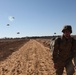 Paratrooper walking off Luzon Drop Zone