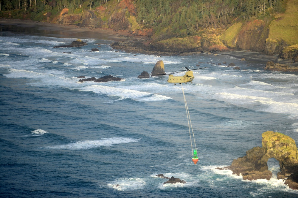 U.S. Army aircrew recovers buoy