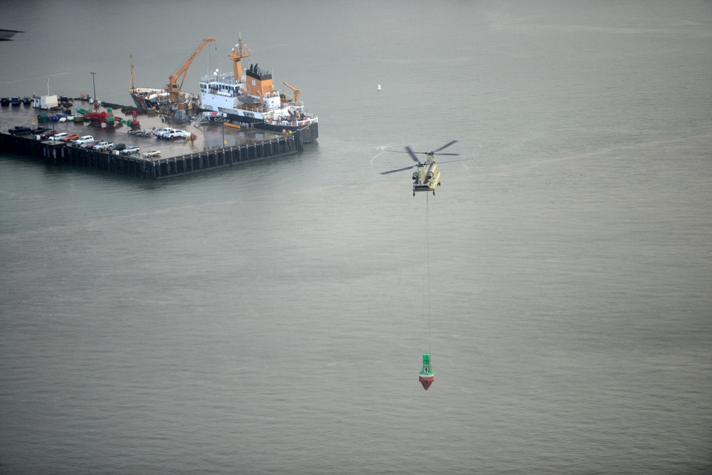 U.S. Army aircrew recovers buoy