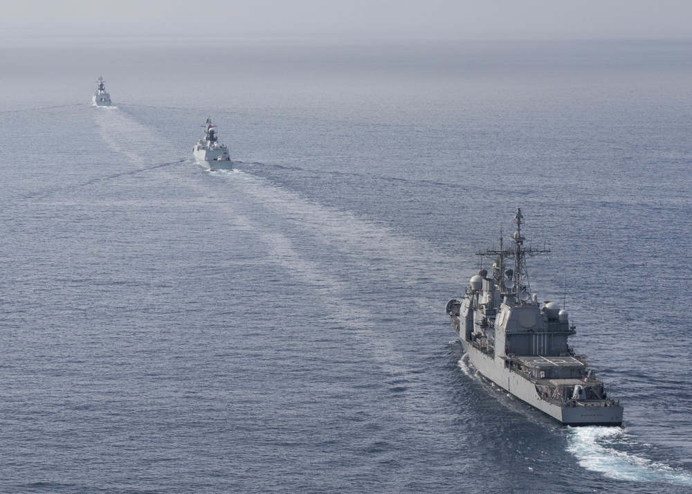 USS Bunker Hill Participates In Maneuvering Exercise With Chinese Ships