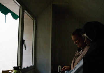 Lending a helping hand: Marines and Sailors volunteer at local monastery