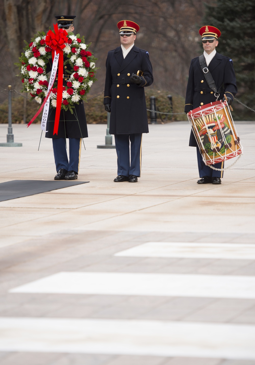 Paul “Triple H” Levesque and WWE Chief Brand Officer Stephanie McMahon place a wreath at the Tomb of the Unknown Soldier in Arlington National Cemetery