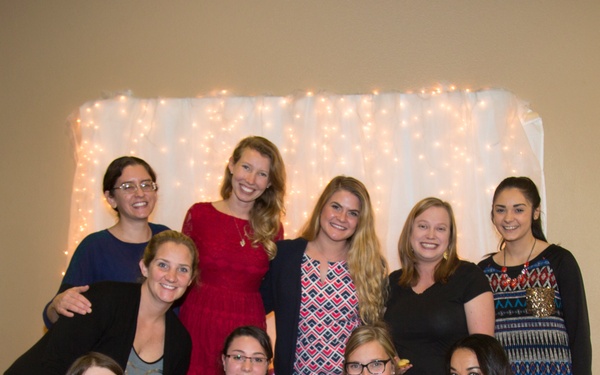 Military spouses exhange cookies and ornaments