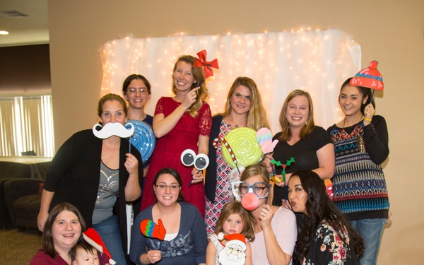 Military spouses exhange cookies and ornaments