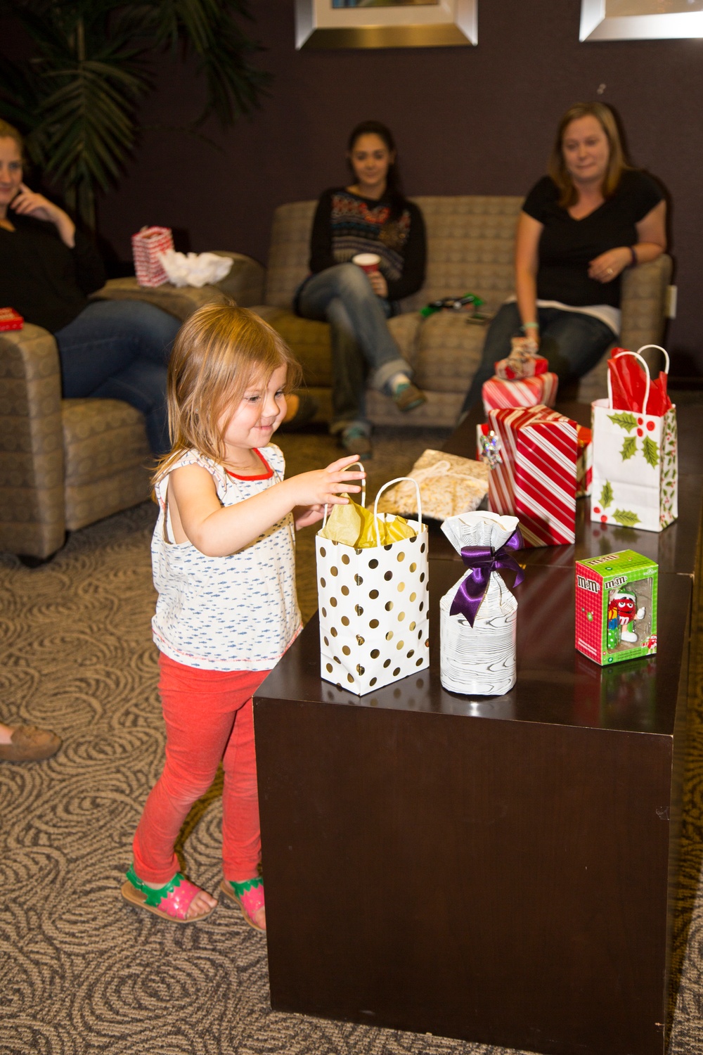 Military spouses exhange cookies and ornaments
