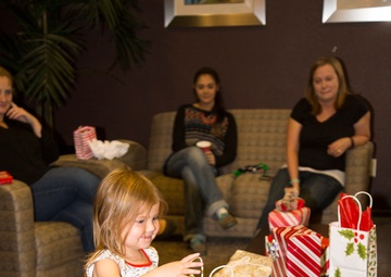 Military spouses exhange cookies and ornaments