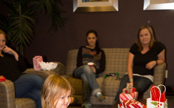 Military spouses exhange cookies and ornaments