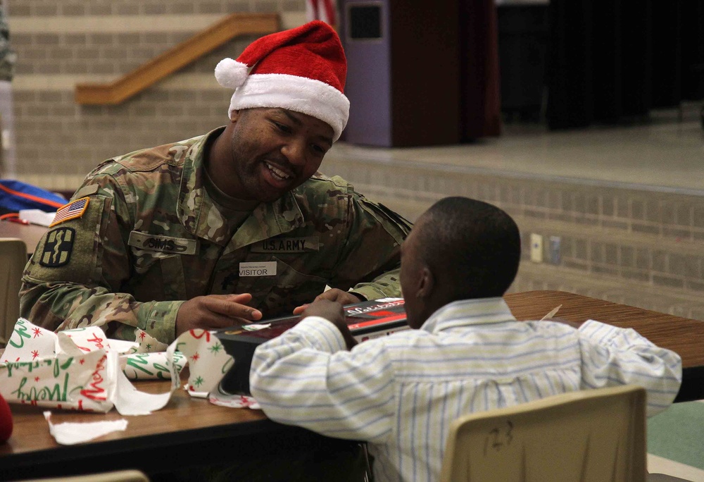 Air Cav Troopers deliver gifts to students