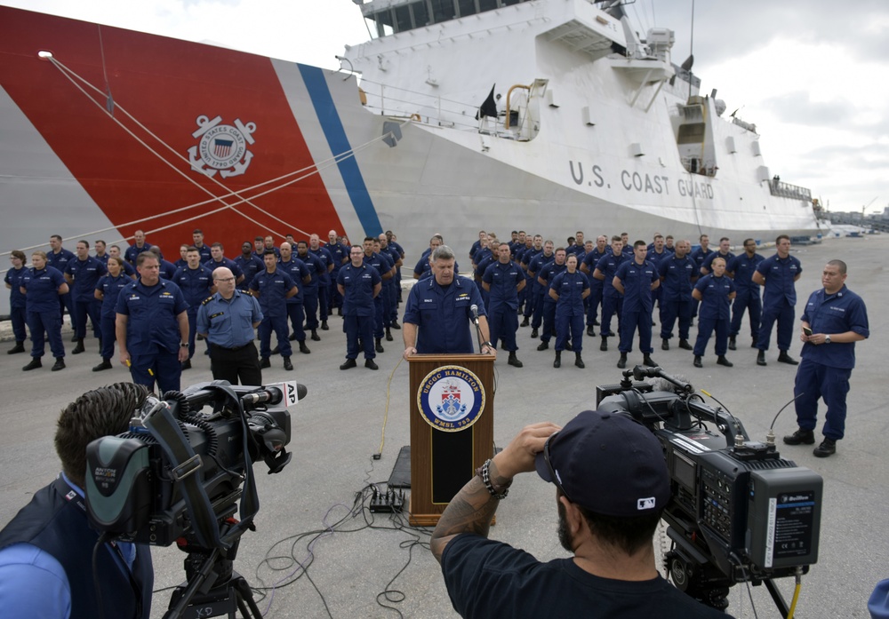 Vice Admiral Karl L. Schultz speaks at a press event in Port Everglades with Commodore Craig Baines and Capt. Scott Clendenin