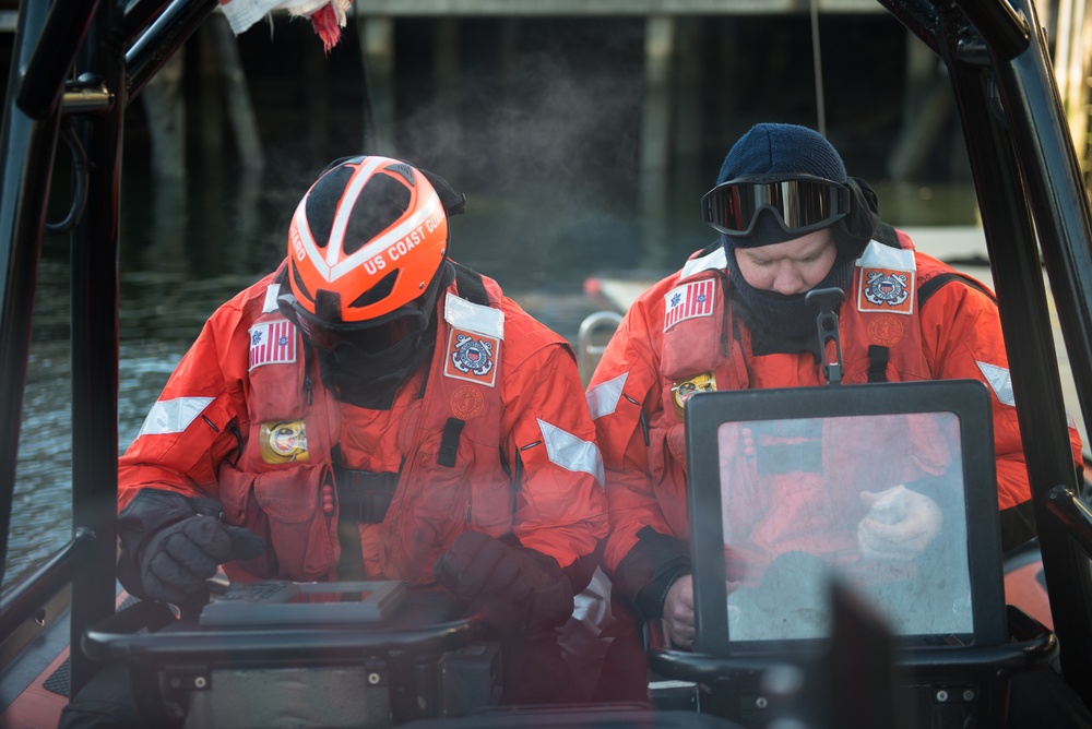 Coast Guard Cutter Spencer crew prepares to get underway in bitter cold