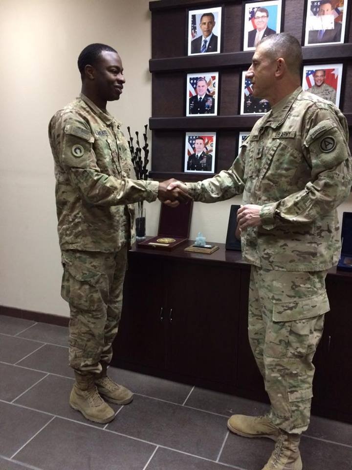 1st TSC Soldier Coined for Deployment Achievements
