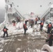 Crew of CGC Alder clears ice from deck