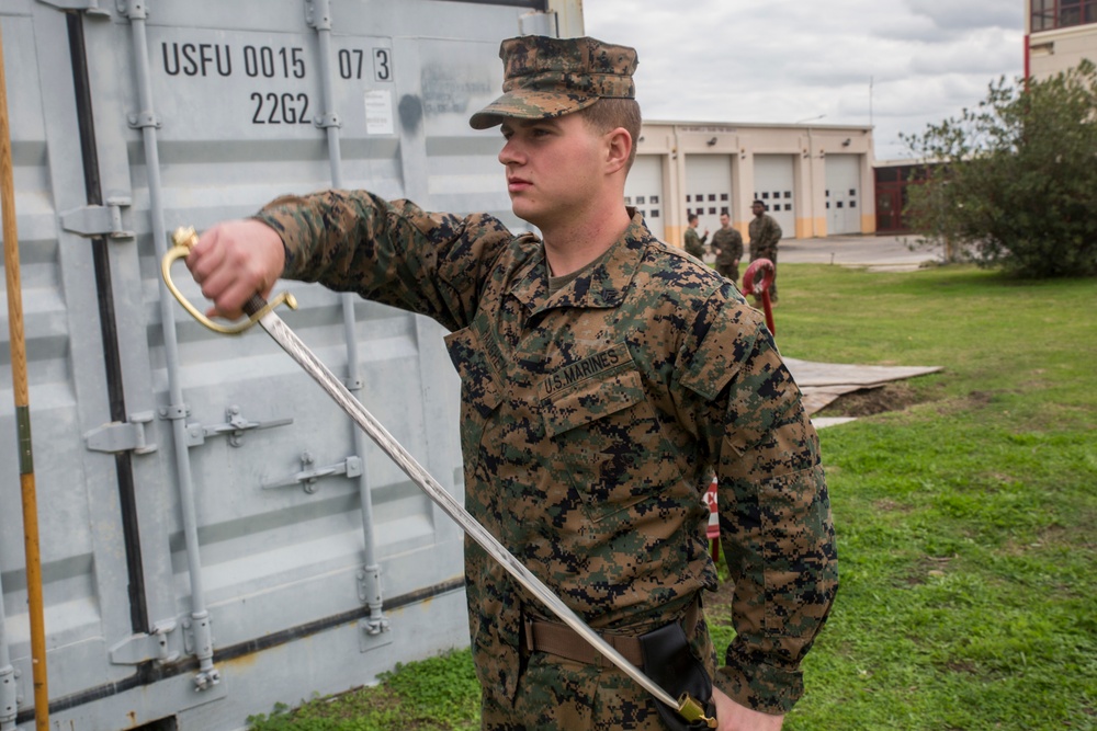 Committed to excellence: Marines participate in sword and guideon manual training