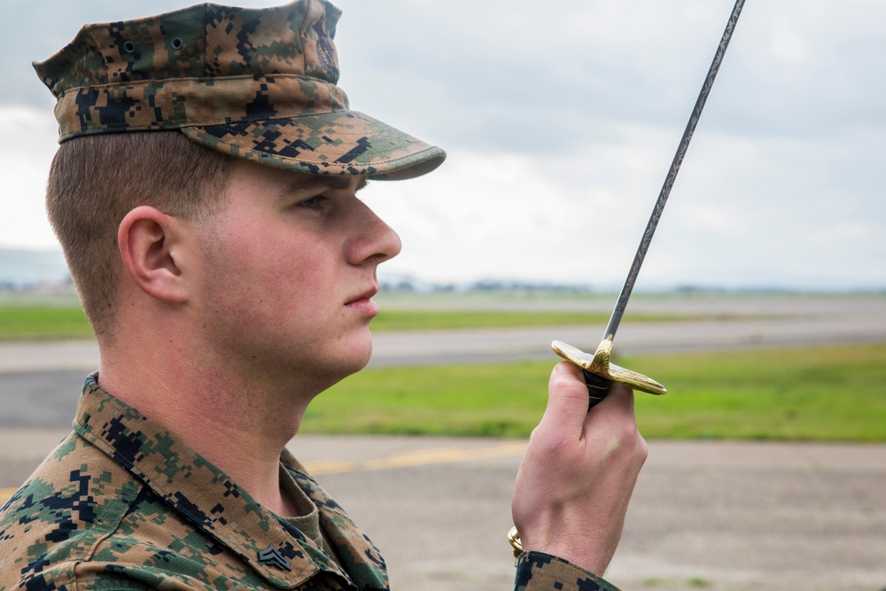 Committed to excellence: Marines participate in sword and guideon manual training