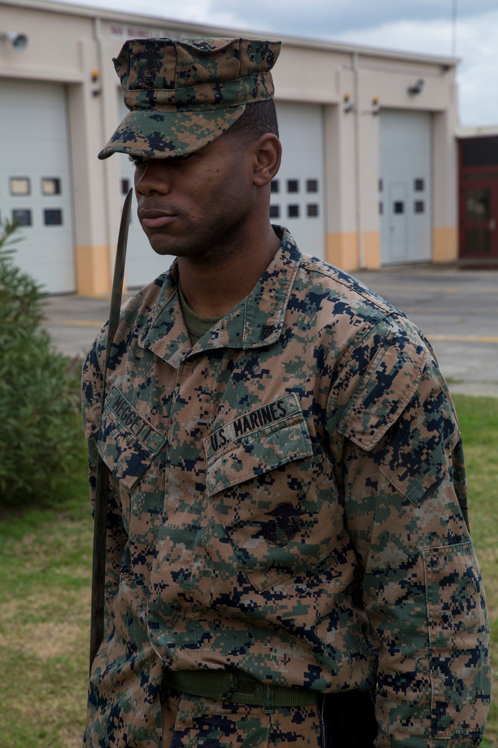 Committed to excellence: Marines participate in sword and guideon manual training