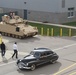 Military, private and commercial vehicles cruise the Detroit Arsenal