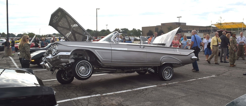 Military, private and commercial vehicles cruise the Detroit Arsenal