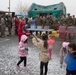 ASYMCA brings holiday joy to Combat Center