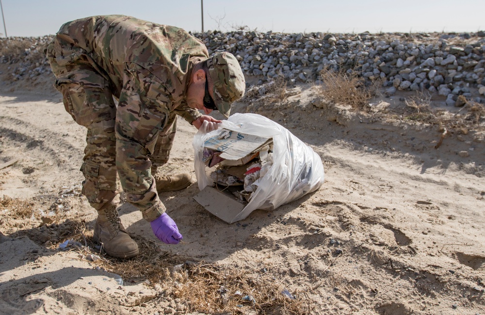 Deployed Soldiers Clean up Camp