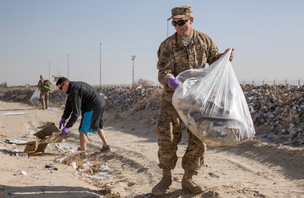 Deployed Soldiers Clean up Camp