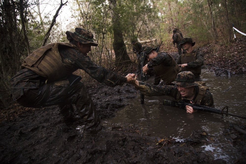 Combat Camera Marines navigate obstacle  Courses